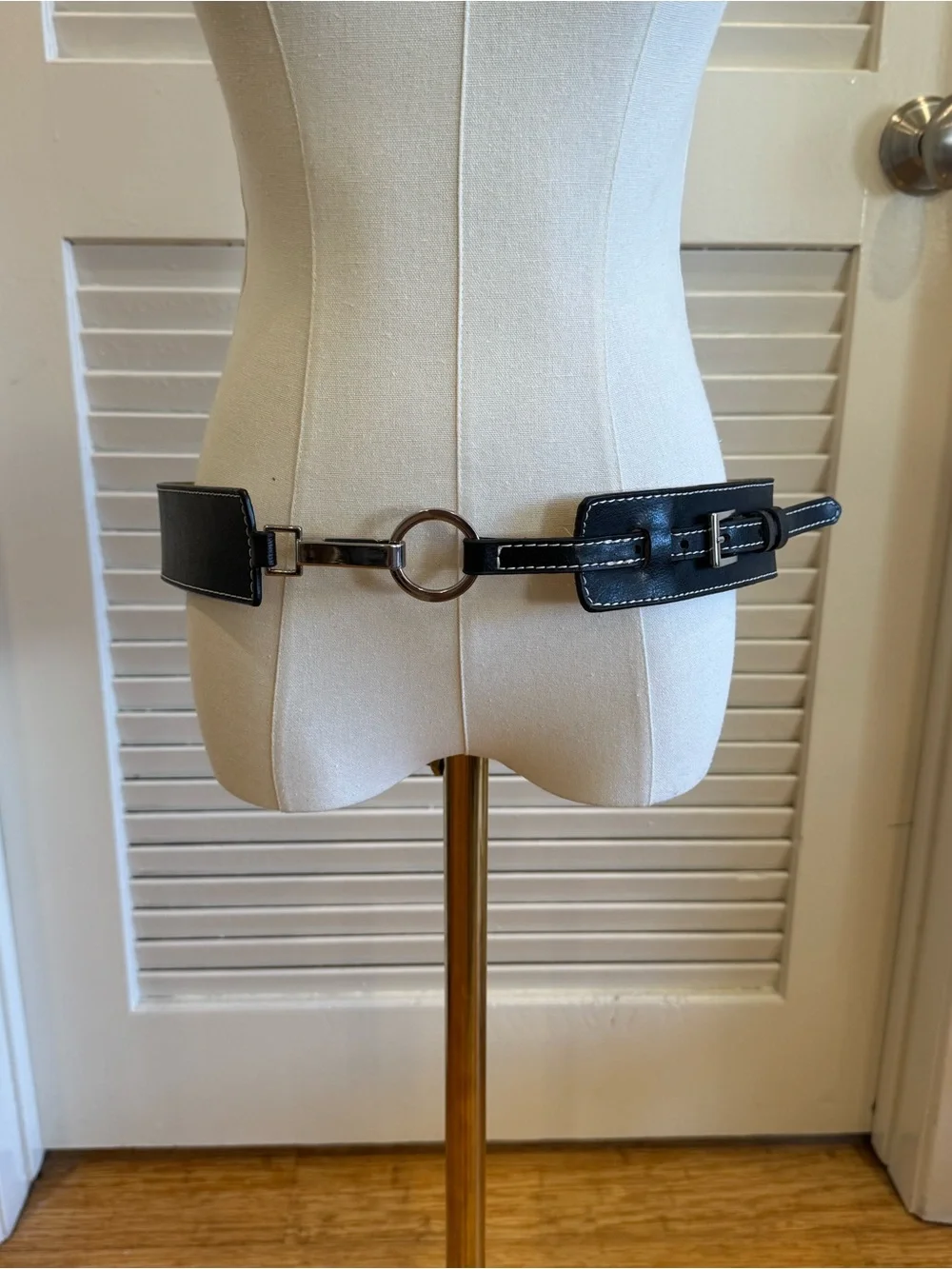 Black leather belt with silver ring buckle